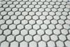 Close-up of Dogwood White Glazed Porcelain Hex Tiles